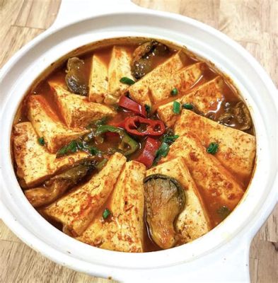  Changde Shi Shi Spicy Stewed Tofu: ¡Un viaje ardiente de texturas crujientes y sabores umami!