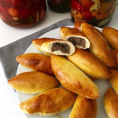  Pirozhki de carne: ¡Un bocado delicioso y reconfortante que te transporta directamente a la Rusia zarista!