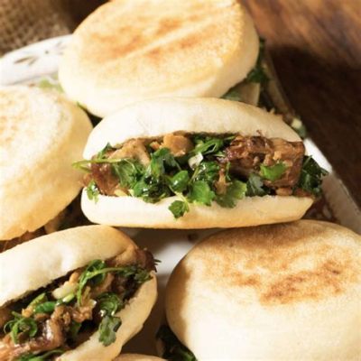  Rou Jia Mo: ¡Un Manjar de Carne Jugosa en Pan Estilo Bao!